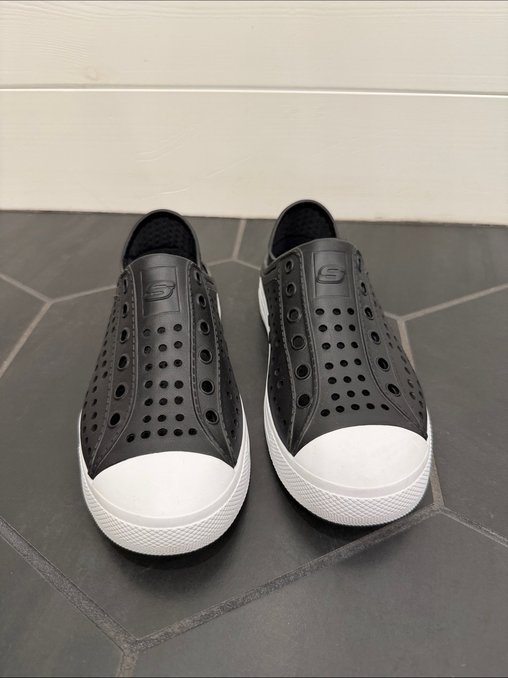 Skechers Men's Black Slip-On Perforated Loafers with White Toe Cap